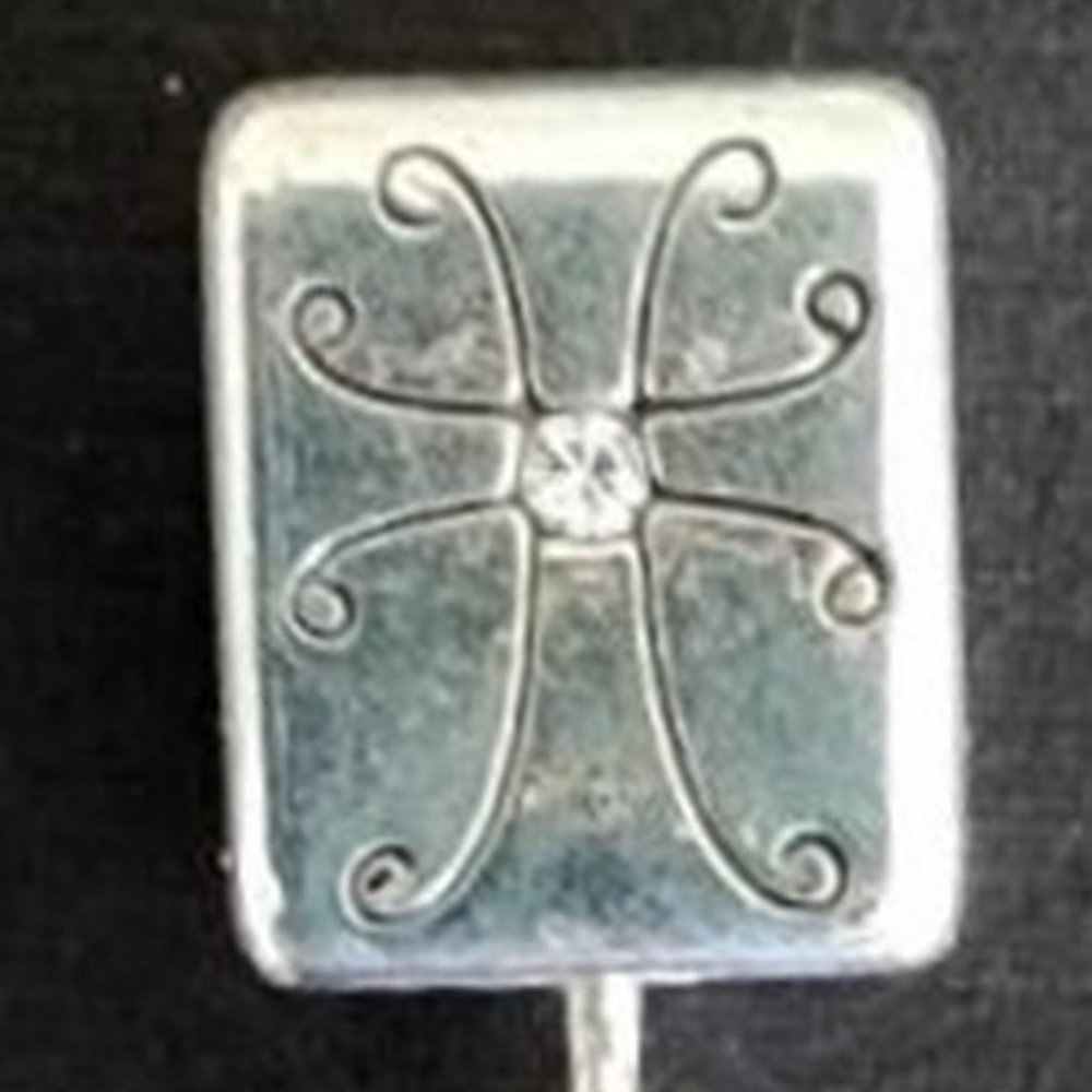 Brighton Charm Decorative box with Gold cross hanging from it.
